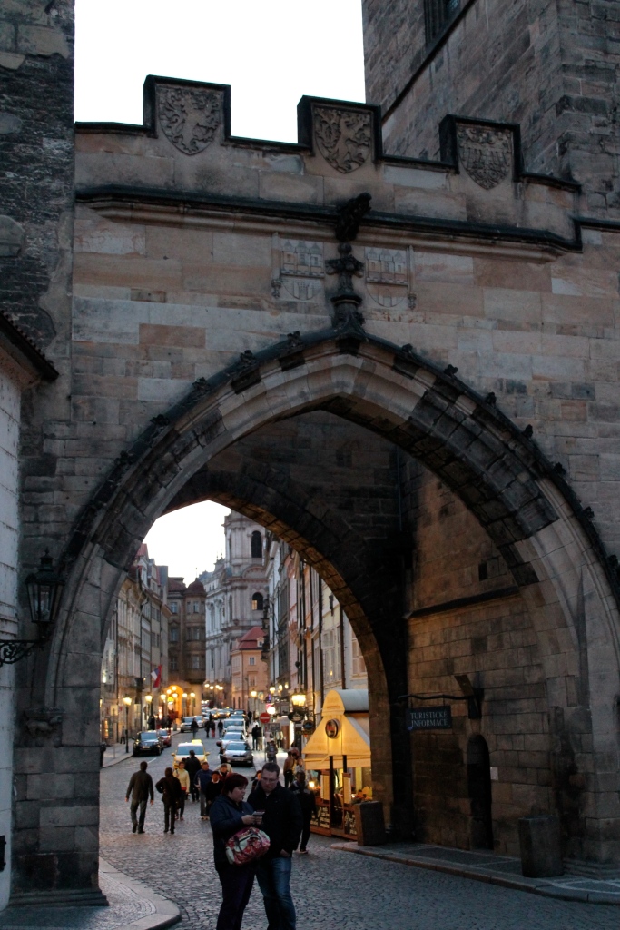 Looking through the end of St. Charles Bridge, into Prague Castle